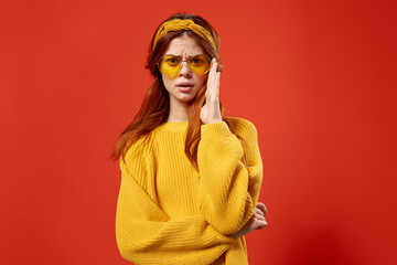 attractive woman in yellow sweater glasses fashion decoration studio