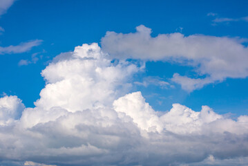 Naklejka na ściany i meble Background of white Clouds In Blue Sky