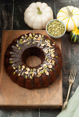 Chocolate pumpkin cake with pumpkin seeds and linseed