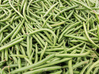 Green bean produce display at local grocery store market.