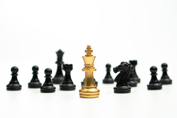 Golden Chess King standing to Be around of other chess, Concept of a leader must have courage and challenge in the competition, leadership and business vision for a win in business games