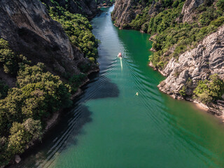 Drone view of Matka Canyon. Drone shot of a lake in a canyon in North Macedonia. Rocky green...