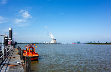 Harbour of Antwerp, Belgium with nuclear power plant
