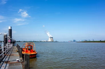 Fotobehang Harbour of Antwerp, Belgium with nuclear power plant  © Gert-Jan van Vliet