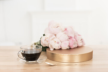 Romantic peonies on a light background. Feminine bouquet for a wedding or birthday.