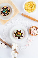 Martabak Mini or Martabak Mini Bangka with various Topping. The martabak mini bangka is made from a mixture of flour, eggs, sugar, baking soda, coconut milk and water.