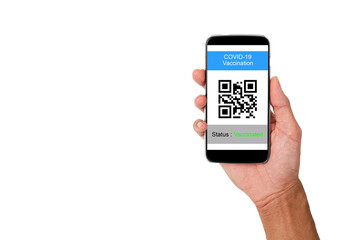 Hand holding a mobile phone showing the status of vaccination against COVID-19