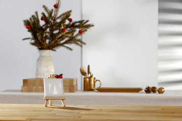 Wooden table with vacant space and Christmas background with sun shadow 