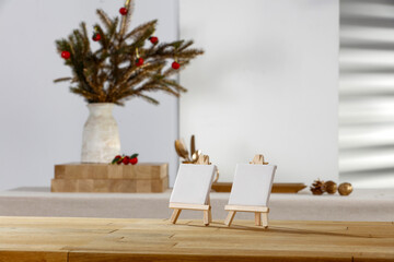 Wooden table with vacant space and Christmas background with sun shadow 