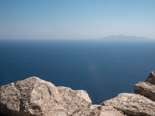 Rocks and top view of the sea and the island. Santorini Greece