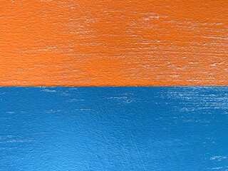 two colors. The wall is painted in different colors.