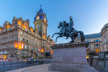 View of The Balmoral Hotel and statue of Arthur Wellesley (1st Duke of Wellington) at dusk