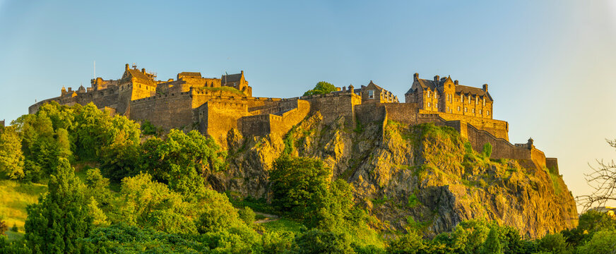 View of Edinburgh Castle from Princes Street at sunset, UNESCO World Heritage Site