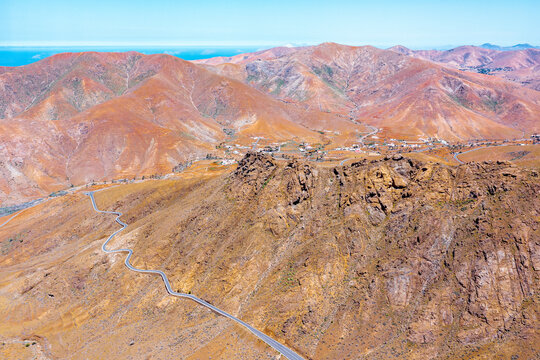 Aerial view of desert road in the barren landscape, Mirador del Risco de las Penas, Pajara, Fuerteventura, Canary Islands