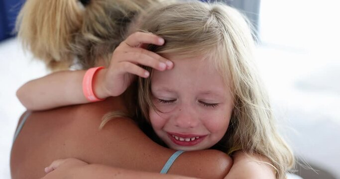Mom hugs crying little girl 4k movie