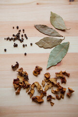 Spices pepper peas, dry mushrooms and Bay leaves