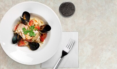 Pasta spaghetti with bechamel sauce. Spaghetti with seafood cream.