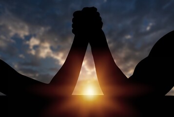 Silhouette of hands that compete in strength. Rivalry, wrestling, strength comparison.