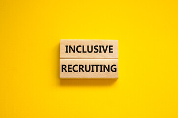 Inclusive recruiting symbol. Wooden blocks with words Inclusive recruiting on beautiful yellow background. Business, HR and inclusive recruiting concept. Copy space.