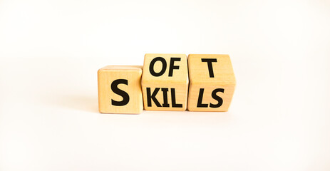 Soft skills symbol. Turned wooden cubes and changed the word 'soft' to 'skills' or vice versa. Beautiful white background, copy space. Business, soft skills concept.