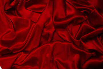 Obraz premium Rich and luxury red silk fabric texture background.