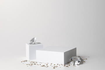 White podium on the white background with diamonds and small crystals. Podium for product, cosmetic...