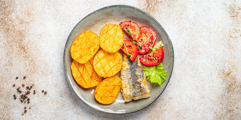 potatoes fried fish seafood fresh ready to eat meal snack on the table copy space food background rustic top view 