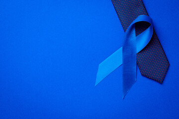 Prostate care. Awareness prostate cancer of men health in November. Blue ribbon, fashion tie...