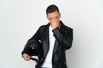 Caucasian man with a motorcycle helmet isolated on white background with tired and sick expression