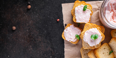 Smorrebrod seafood sandwich fish butter spread shrimp on bread capelin caviar taste fresh portion ready to eat meal snack copy space food background rustic 