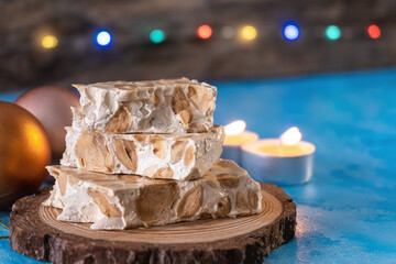 Turron from Alicante, typical Christmas sweet from Spain, with Christmas decoration, with a...
