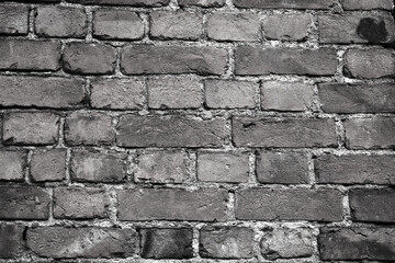 old black and white brick wall