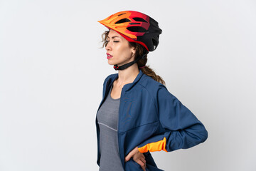Young cyclist woman isolated on white background suffering from backache for having made an effort