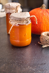 pumpkin jelly marmalade jam sweet dessert canned food fresh portion ready to eat meal snack on the table copy space food background rustic 