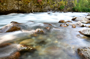 The Little Susitna River flows from Alaska's Talkeetna Mountain Range on a sunny fall day.