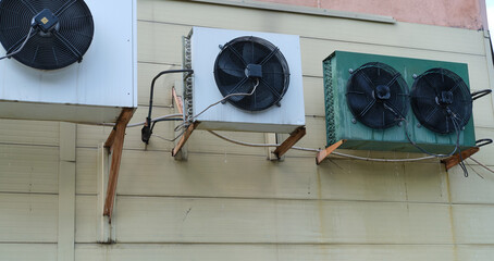 air conditioners on the fassad of the building.
