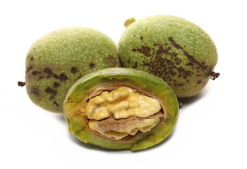 Ripe walnuts with leaf isolated on white background