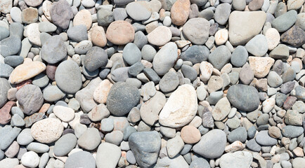 Close-up view of different pebble as background.