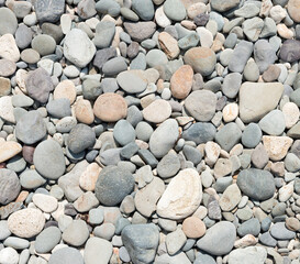 Close-up view of different pebble as background.