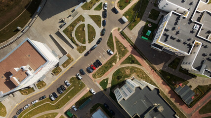 City block. Modern multi-storey buildings. The courtyard area and playgrounds are visible. Aerial photography.