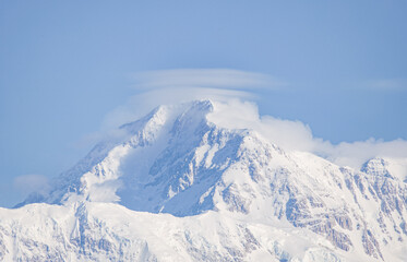 Fototapeta na wymiar Denali with clouds near the peak