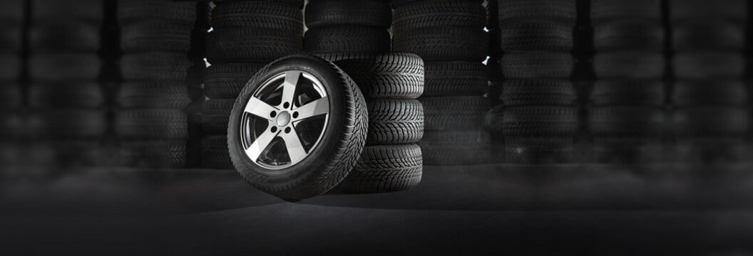 Car tires with a great profile in the car repair shop - warehouse Stock