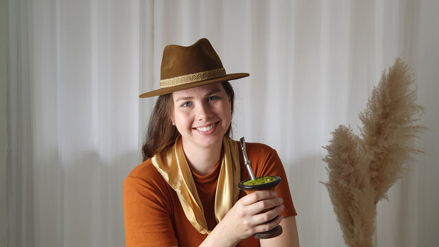 Gaucha drinking chimarrao - Traditional drink of the people of Rio Grande do Sul, southern Brazil.
