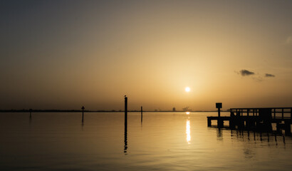 Sunrise over the Pier/Sahara Dust storm affects