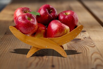Fresh ripe tasty apples on wooden desk