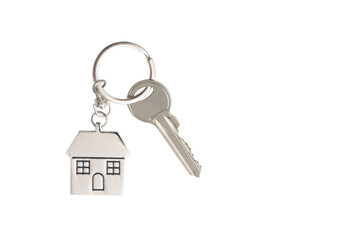 Home key with metal house keychain in keyhole, estate, house key