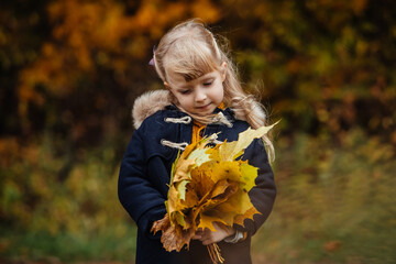 portrait of cute toddle girls in autumn outfit