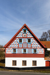 Half-timbered farmhouse, folk architecture in Milhostov, Western Bohemia, Czech Republic