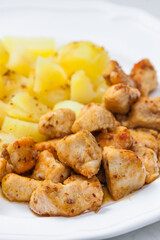 pork meat on cumin with potatoes