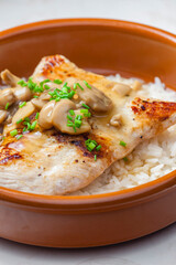 grilled turkey fillet with mushroom sauce and rice